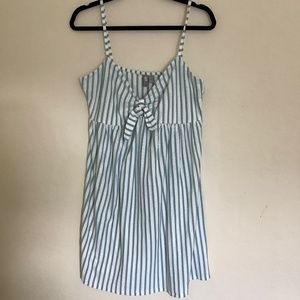 Light blue and white stripped dress with bow.